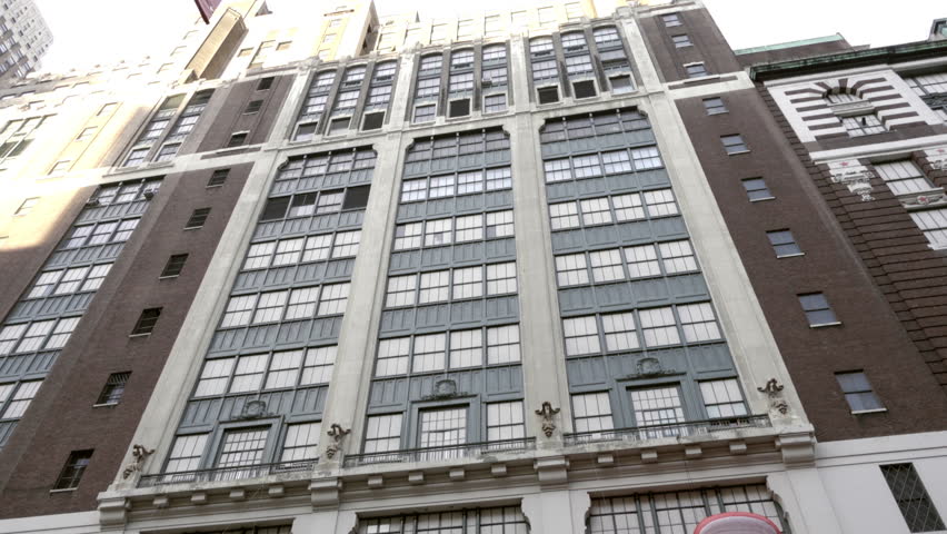 Office Building Entrance With Cars Driving By Office Building Entrance With Cars Driving By