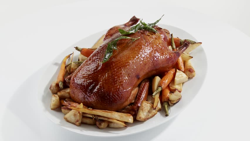 Roast Duck With Root Vegetables Stock Footage Video 2093819 - Shutterstock