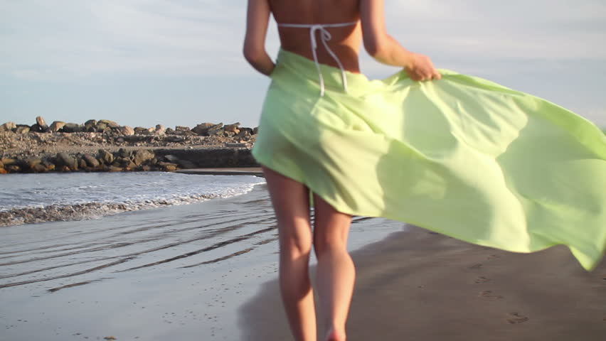 Beautiful Girl In A Bikini Strolls Along A Beach At Sunrise Baja California Sur Mexico Stock 