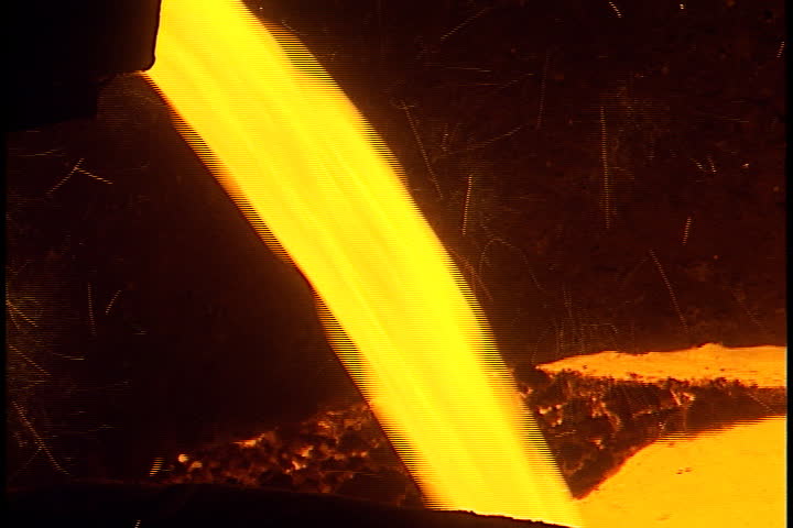 Hot Molten Steel And Sparks Pour From Ladle Into Vat In Calcutta, India 