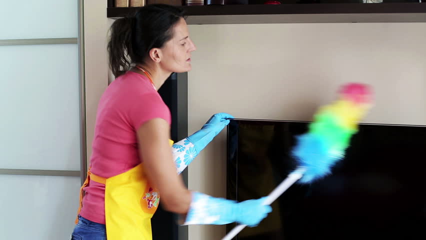 Woman Dusting The Tv And Smiling To The Camera Stock Footage Video 5335910 - Shutterstock