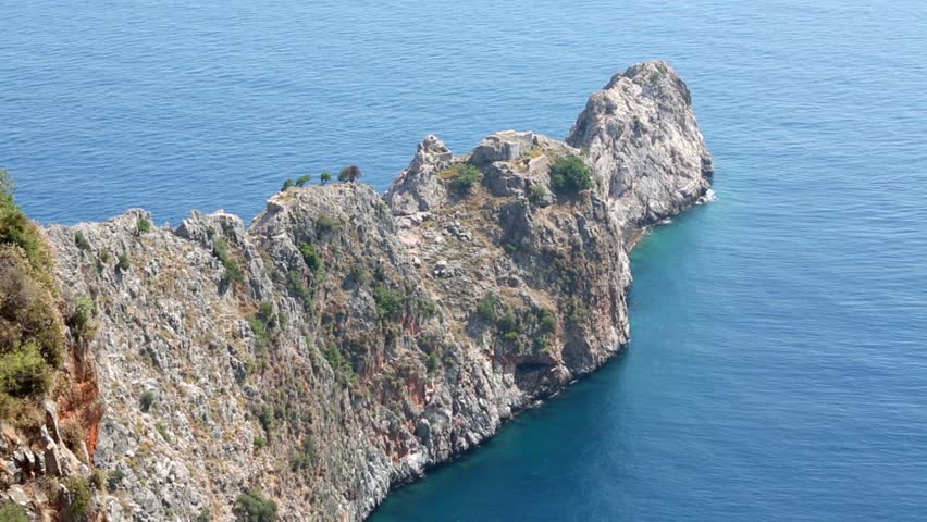 seascape-of-rocky-promontory-protrudes-into-the-sea-stock-footage-video