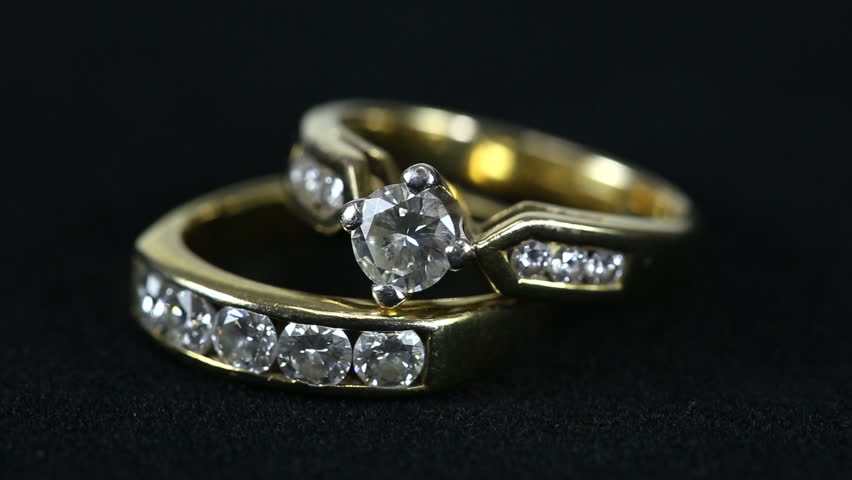 An Animated Diamond Ring That Spins In A Loop Made From Gold Or