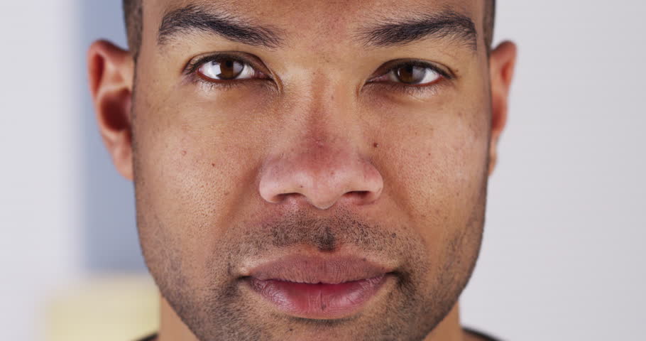 Close Up Of Black Man Looking At Camera Stock Footage Video 6861496 - Shutterstock
