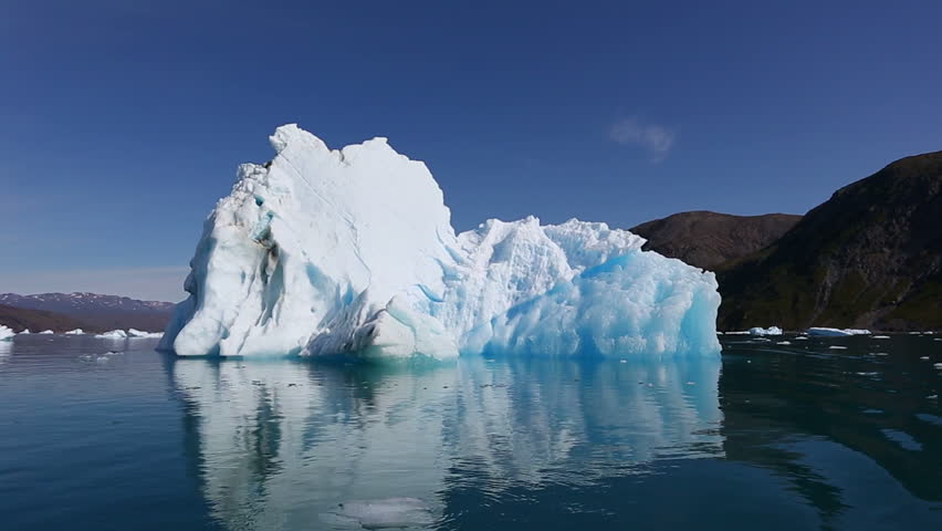 Drifting Through Icebergs Floating In Qooroq Icefjord, South Greenland ...