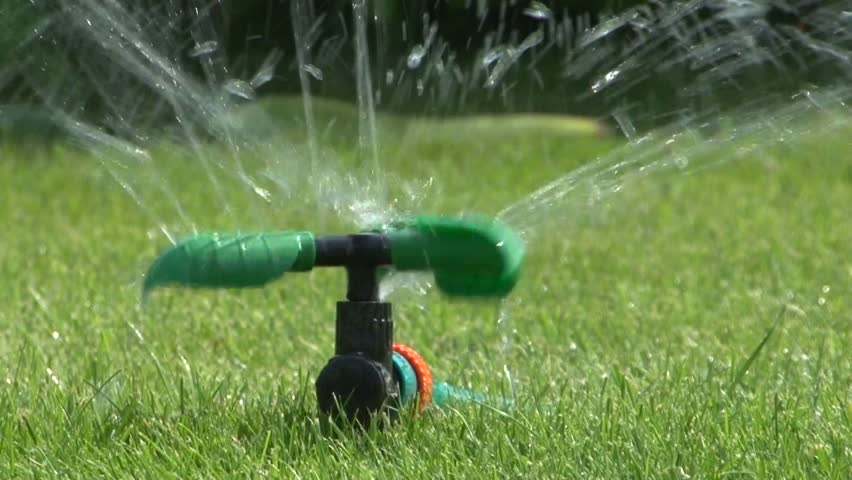 Sprinkler And Naked Child Running Through It Stock Footage Video ...