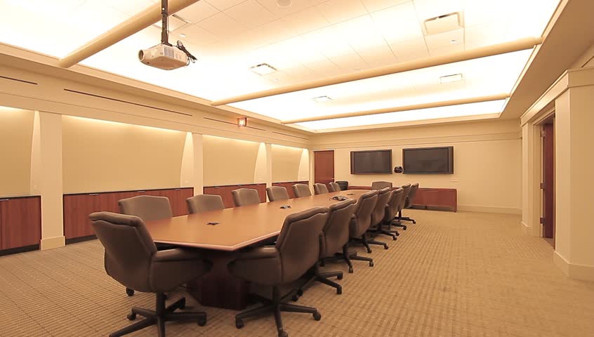 The Inside Of An Intense Conference Room With Flat Screen Televisions ...