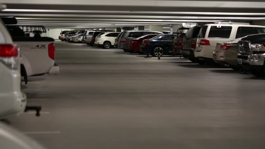 Cars Driving In A Busy Parking Garage In A City Mall Stock Footage ...