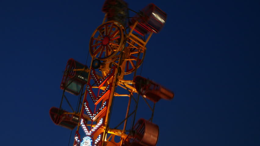 An Amusement Park Ride Called The Zipper At A Country Fair Stock ...