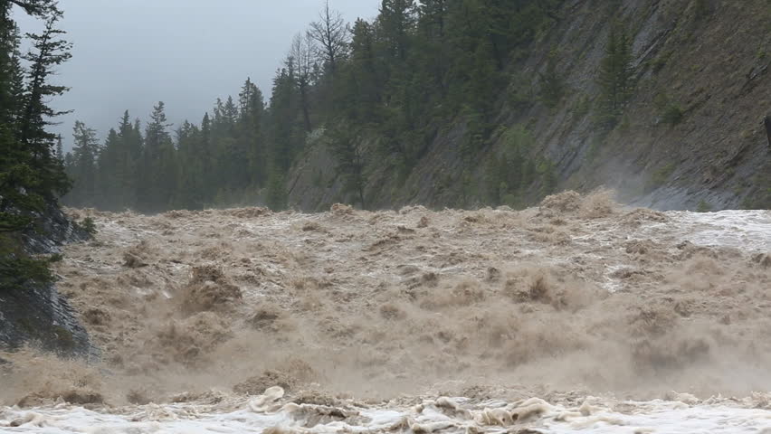 Flood Water Cascading Down Swollen Mountain River Nr Banff, Alberta ...